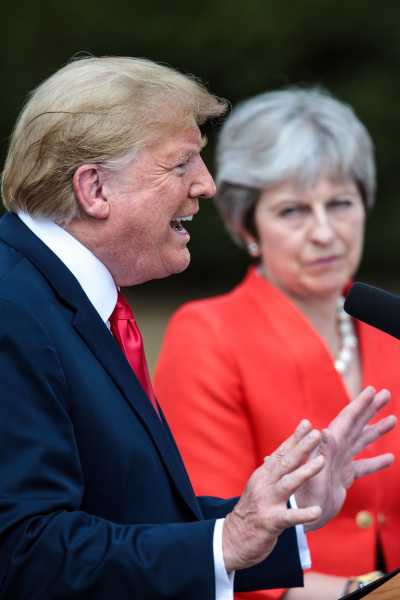 Theresa May says Donald Trump told her to sue the European Union