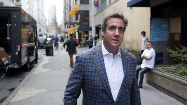 Who are the mystery men photographed sharing cigars with Michael Cohen?